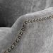 Silla de comedor Legacy de Eichholtz con tapizado gris Clarck