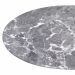 Mesa de comedor Flow de Eichholtz mármol gris y latón cepillado